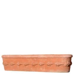 Cassetta da davanzale in terracotta con decorazione a frutta e foglie in rilievo, forma rettangolare