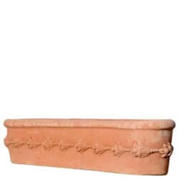 Cassetta da davanzale in terracotta con decorazione a frutta e foglie in rilievo, forma rettangolare