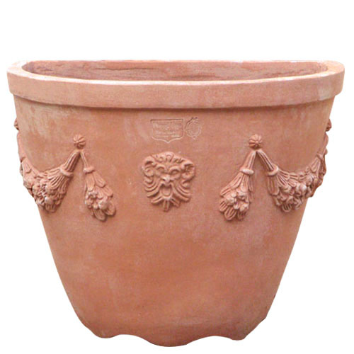 Festooned high faucet basin in terracotta, wall pocket for climbers and rose bushes. Elegant shape with classic decorations. Handmade, frost-resistant.