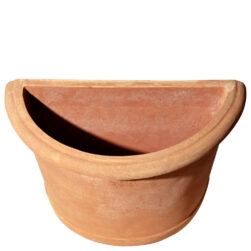 Wall pot. The wonderful and elegant shape and design of the pot decorates the furniture. Handmade, using Impruneta clay, resistant to frost up to – 30° C. Great duration, the shape remains unchanged over the course of the time. The article acquires a beautiful exterior aspect over the course of the seasons. Available in one size only.