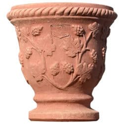 Vasetto decorato con uva in terracotta di Impruneta, piccolo vaso con tralci, foglie e grappoli a rilievo.