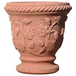Vasetto decorato con uva in terracotta di Impruneta, piccolo vaso con tralci, foglie e grappoli a rilievo.