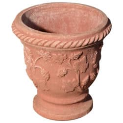 Vasetto decorato con uva in terracotta di Impruneta, piccolo vaso con tralci, foglie e grappoli a rilievo.