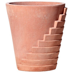 Ana stairs. Land Collection. Modern plant pot. Designed by Ana Milena Hernandez Palacios from Masquespacio for the 100th anniversary of the Terrecotte Poggi Ugo , it develops a series of relief stripes with precise proportions, on a shell of a typical plant pot. One has the impression that the cone pot is protected as by a sturdy stepped shell, repeated at the same distance from each other. When viewed from the rear, starting from a small portion at the top, a sort of staircase develops to the right and left, which gradually wraps around the primary vessel. In profile you have a different view of the vase cut in trellis; finally, in front, it is as if a curved staircase descended from both sides to approach the center of the scene.