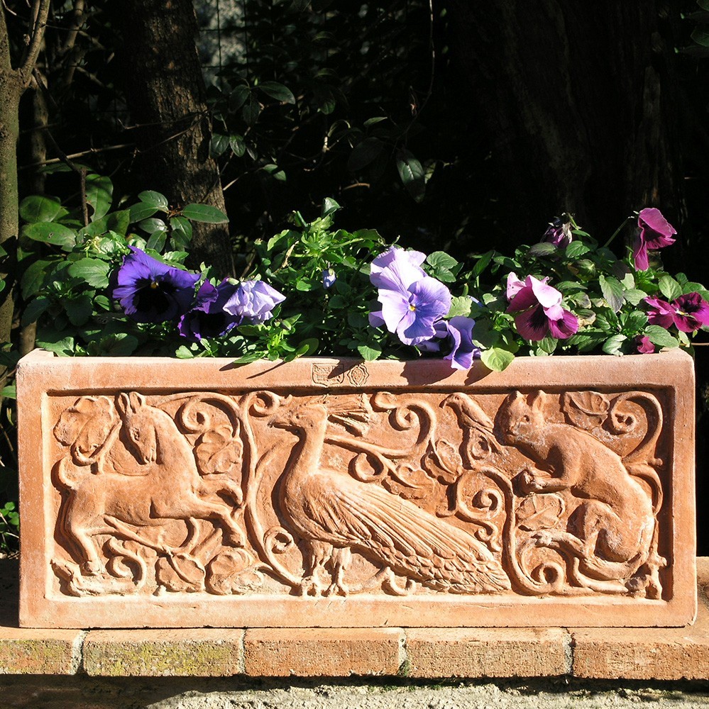 Flower box decorated in relief in the classic style of the vase era. Square or rectangular section shape. Handmade, frost resistant.