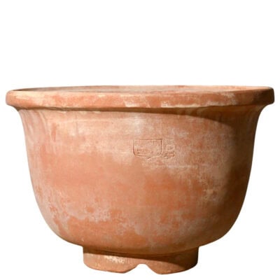 Chinese pot with trimmed base in Impruneta terracotta, rounded shape with thick upper rim and decorative base.