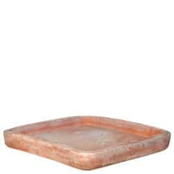 Handcrafted terracotta accessory, ideal for supporting pots and collecting plant drainage.