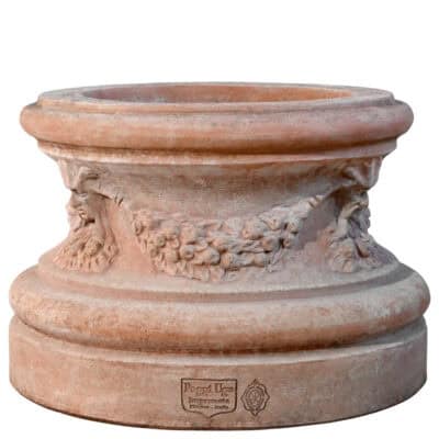 Festooned base with mascaron in Impruneta terracotta, cylindrical support decorated with fruits, leaves, and raised mascarons.
