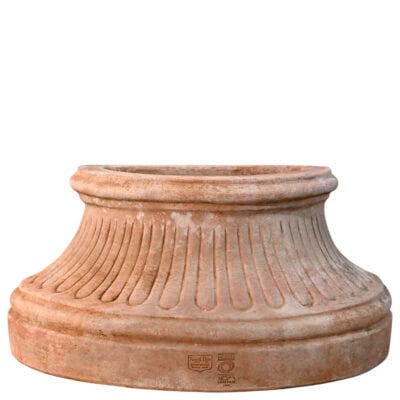 Fluted wall base in Impruneta terracotta, semicircular structure with vertical grooves and flat back for wall attachment.