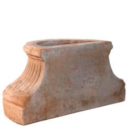 Fluted wall base in Impruneta terracotta, semicircular structure with vertical grooves and flat back for wall attachment.