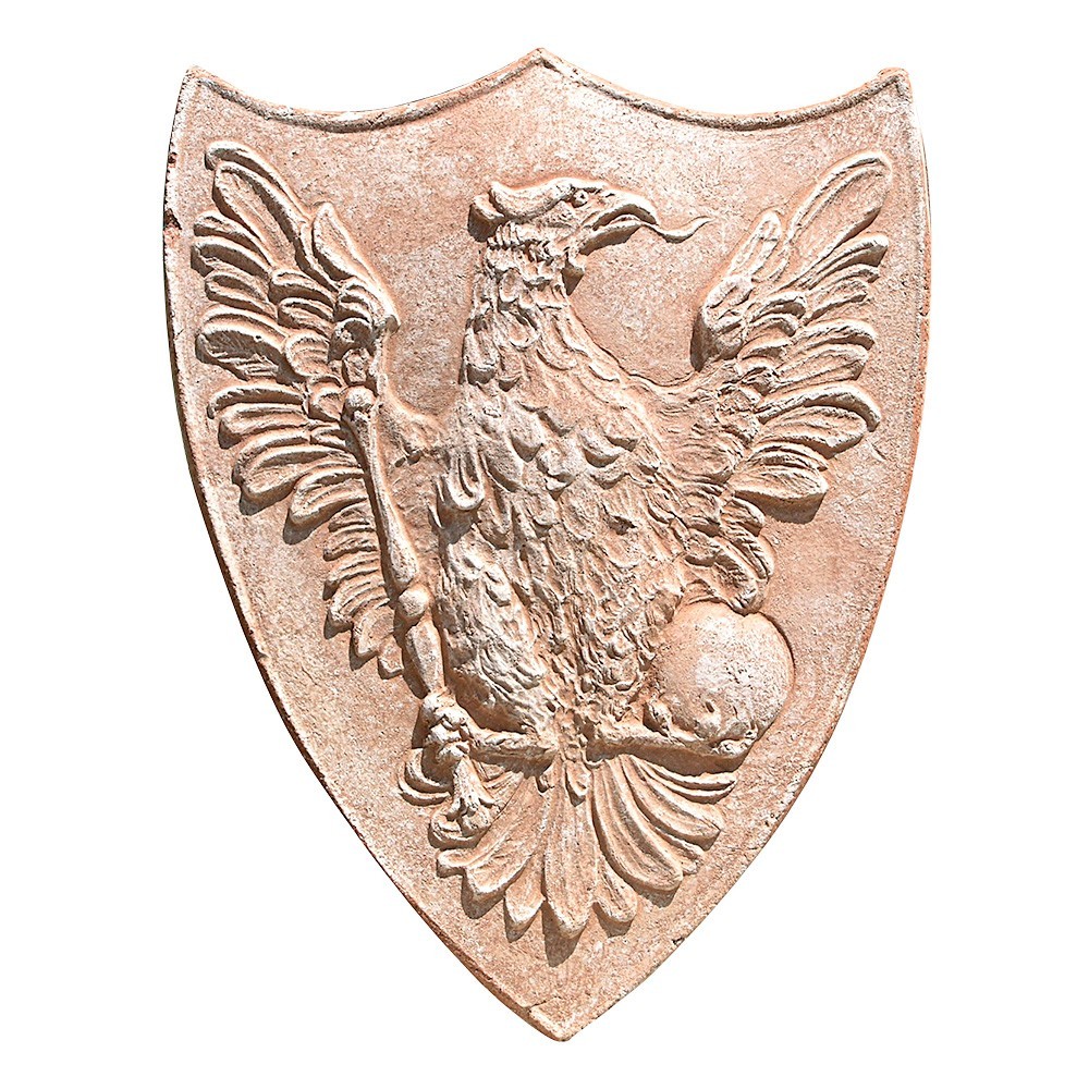 Shield decoration, depicting an eagle with hanging holes. Modeling made in high relief. Handmade by master craftsmen.