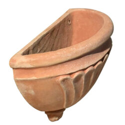 Wall-mounted terracotta planter and sink from Impruneta, featuring grooved patterns, ideal for plants, flowers, and rustic decor.