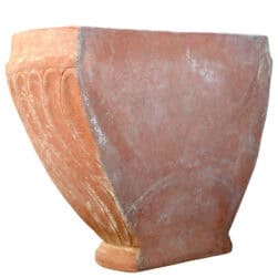 Terracotta wall planter with spiral-columned ribbed surface in half-moon shape