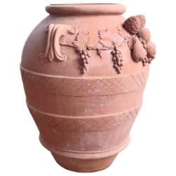 Festooned Relief Jar, suitable as a planter. Decorative element adorned with embellishments, pinecones, grapes, apples, pears, and lemons. Fruit in relief.