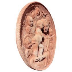 "Madonna with Child and Six Angels" in terracotta, inspired by the Della Robbia workshop, with a corded frame, symbolizing serenity and sacred harmony.