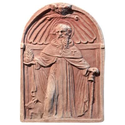 Pannello in terracotta con Sant’Antonio Abate in bassorilievo
