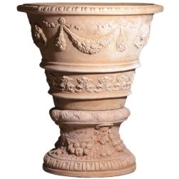 Plant pot decorated in relief with little girl, ribbons and Medici base. Suitable for classic or historical environments and furnishings. Handmade, frost resistant.