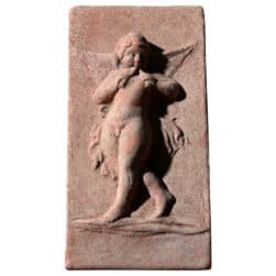 Terracotta relief panel with winged angel holding flutes, Renaissance-style decorative artwork