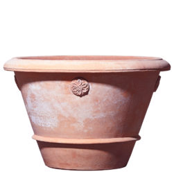 Pot for plants. Cylindrical shape, acquires a beautiful exterior aspect over the course of the seasons. Accessories: flowerpot saucer, Feet