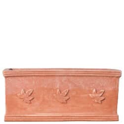Rectangular terracotta planter box with three ivy leaves in relief on the front.