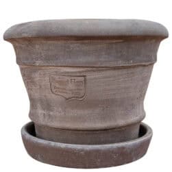 The Small Pot with Hems. A handmade Impruneta terracotta piece with three decorative hems and a timeless design.